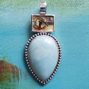 Roman Silver Tone Pendant